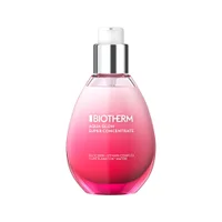 A teardrop-shaped bottle of Biotherm Aqua Glow Super Concentrate serum, featuring a pink gradient glass design with a white pump dispenser against a plain white background.