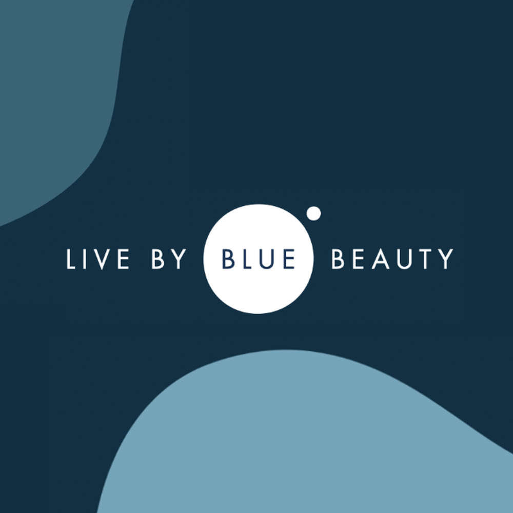 alt="Live by Blue Beauty — Biotherm's sustainability philosophy logo on a dark navy background with organic blue shapes."
