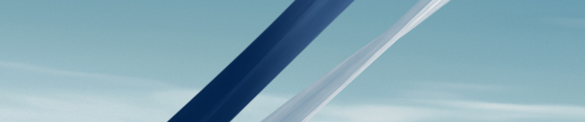 Woman against blue sky background